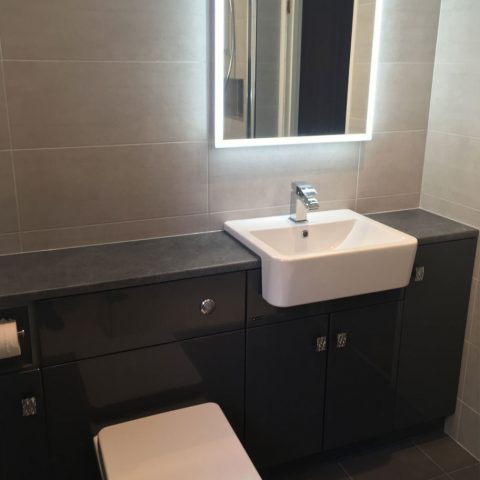 bathroom tiles sink toilet illuminated mirror