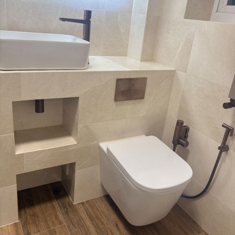 walk in shower room sink tiling flooring toilet