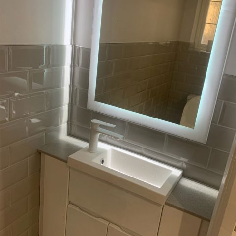 space saver sink illuminated mirror